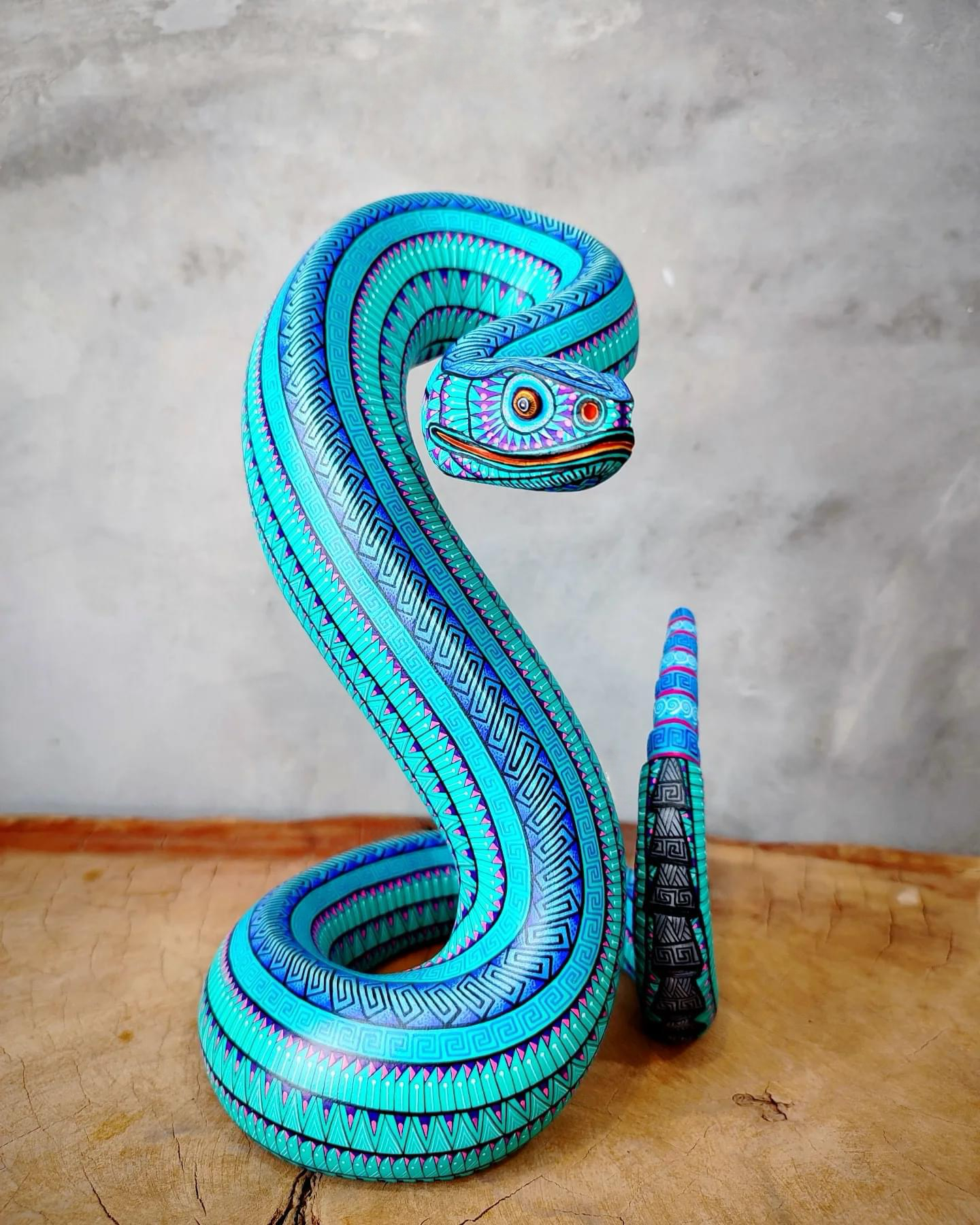 wooden snake sculpture, snake art