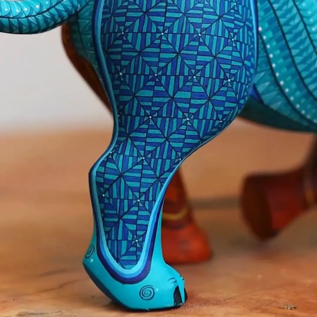 painted wooden rhino sculpturem, mexican alebrije