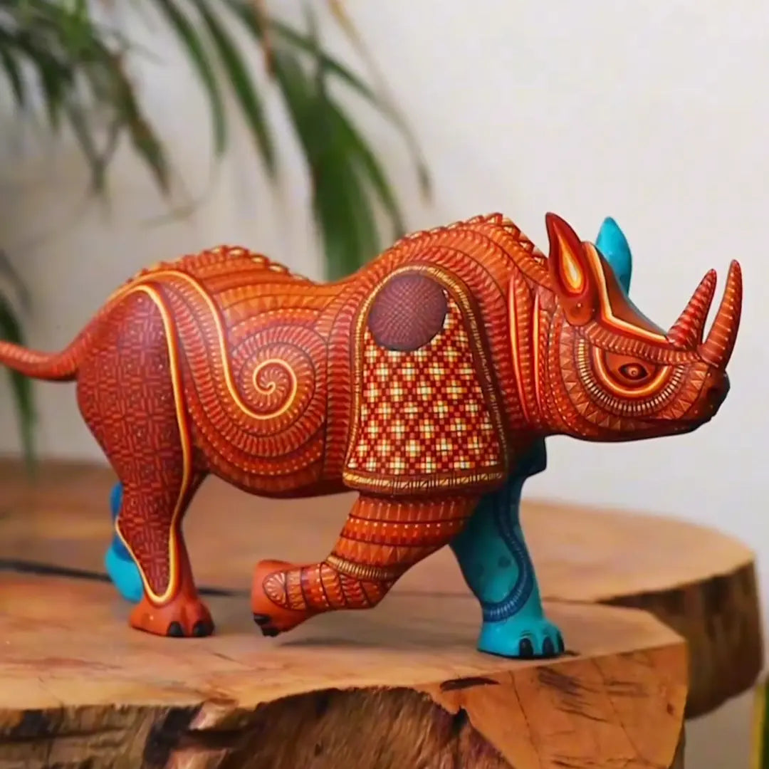 painted wooden rhino sculpturem, mexican alebrije