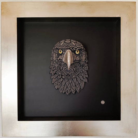 Framed eagle sculpture