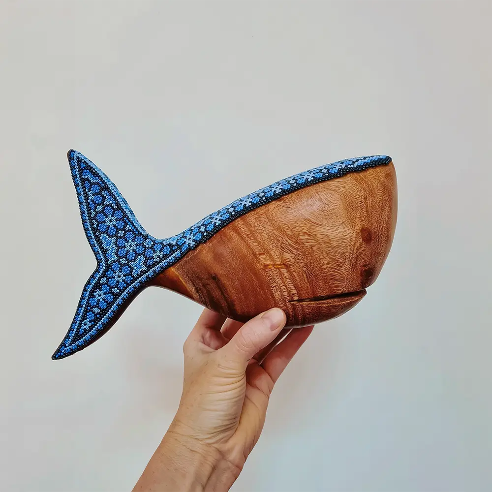 wooden whale figurine with huichol art. mexican beadwork